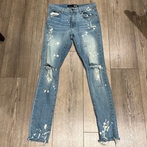 Rustic Dime Ripped Blue Jeans